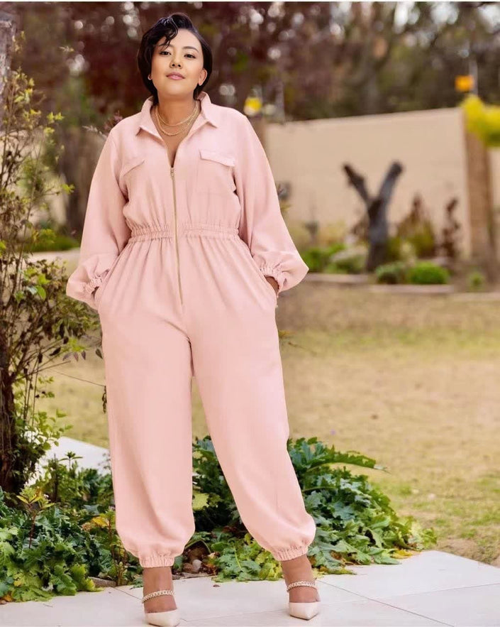 Rose-pink collared long-sleeve jumpsuit with front zipper and elastic waist