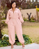 Rose-pink collared long-sleeve jumpsuit with front zipper and elastic waist