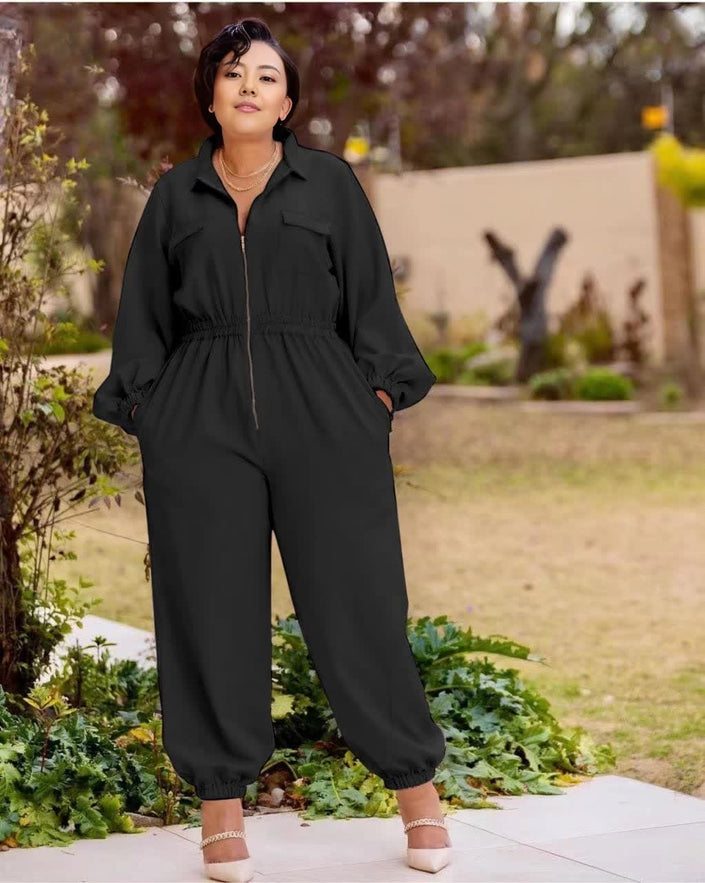 Black collared long-sleeve jumpsuit with front zipper and elastic waist