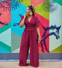 Maroon V-neck puff-sleeve stretch-waist jumpsuit with wide legs