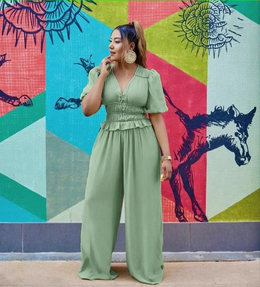 Green V-neck puff-sleeve stretch-waist jumpsuit with wide legs