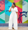 White V-neck puff-sleeve stretch-waist jumpsuit with wide legs