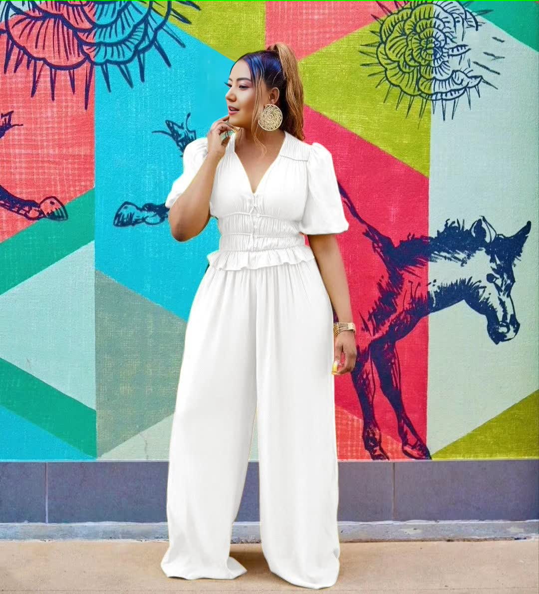 White V-neck puff-sleeve stretch-waist jumpsuit with wide legs