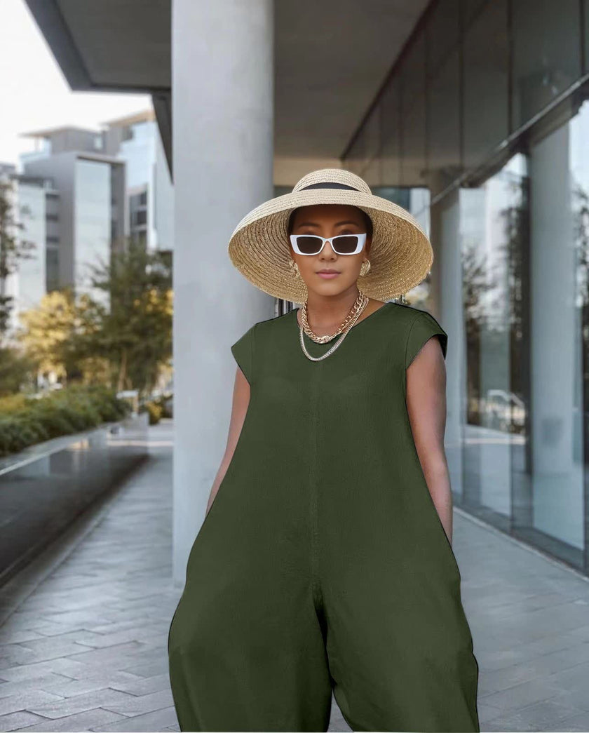 Olive crew-neck wide-leg jumpsuit with roomy cut and wide pant legs.
