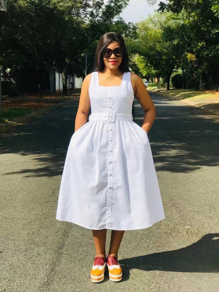 White sleeveless midi dress with belt and button front