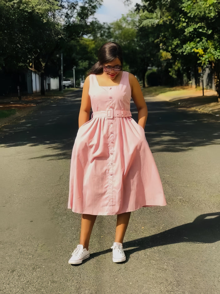 Pink sleeveless midi dress with belt and button front