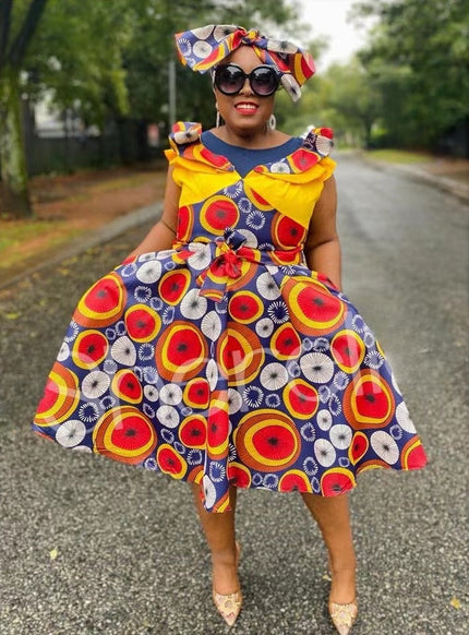 Colorful patterned midi dress with ruffle puff sleeves and full flared skirt