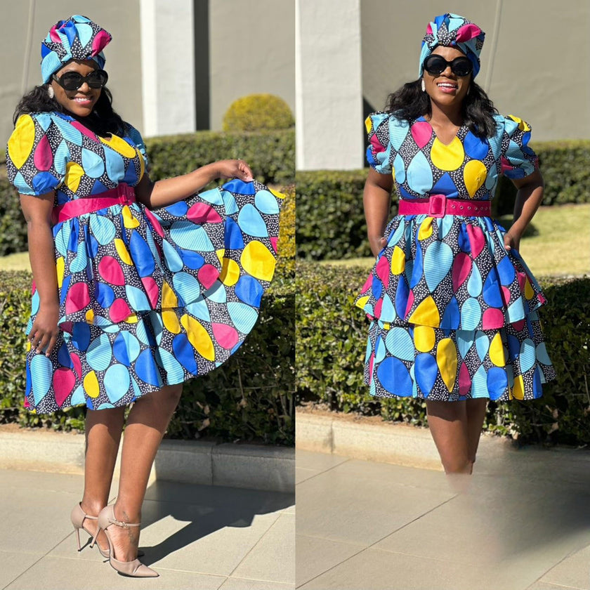 Geometric print midi dress with puff sleeves and gathered waist
