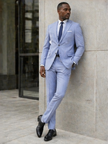 Light blue three-piece slim-fit suit with navy tie and matching trousers