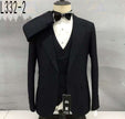 Men's black three-piece suit jacket and vest with bow tie