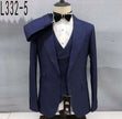 Navy three-piece men's suit with single-breasted jacket, notched lapels, and matching vest