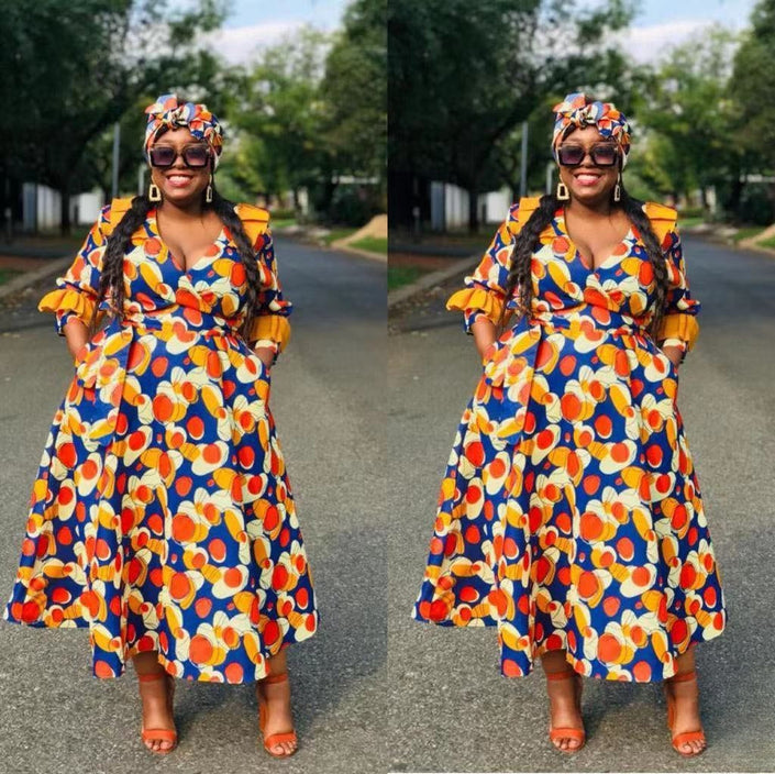 Ruffle-sleeve dress with blue and orange geometric print, flared skirt, V neckline