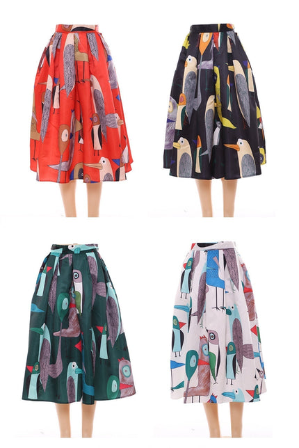 Pleated midi skirt with printed bird pattern in red, green, and blue