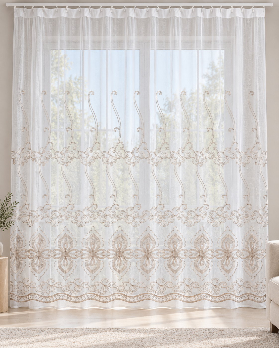 White sheer curtain with ornate beige embroidery and a floral geometric border