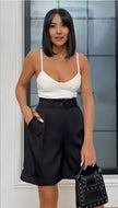 High waist stretch shorts, black, pleated front, mid-thigh length.