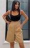 High waist stretch shorts, khaki tan, structured front with pleat details.
