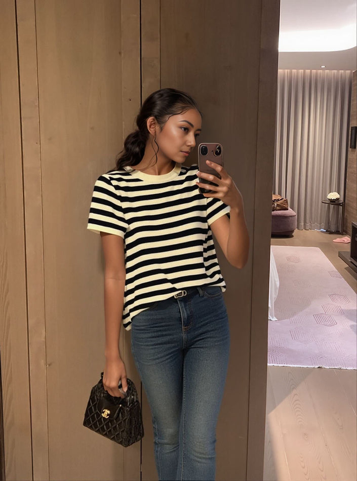 Striped knit top with short sleeves, black and cream horizontal stripes