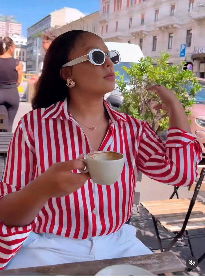Red-and-white striped long-sleeve button shirt
