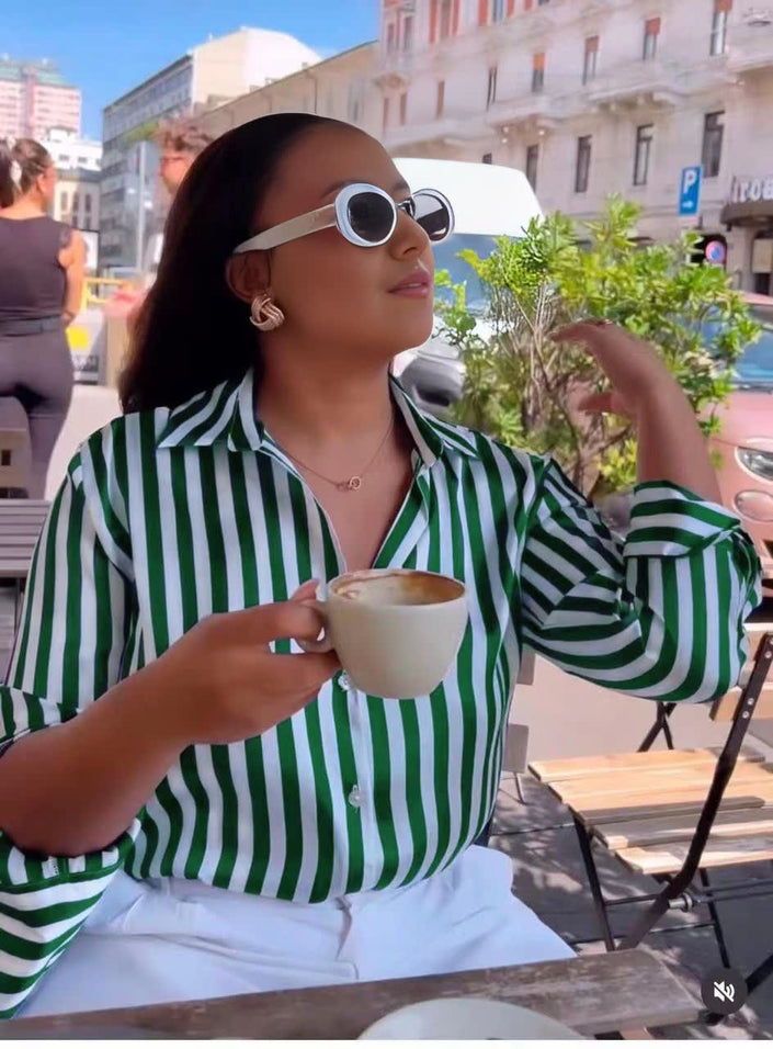 Green-and-white striped long-sleeve button shirt