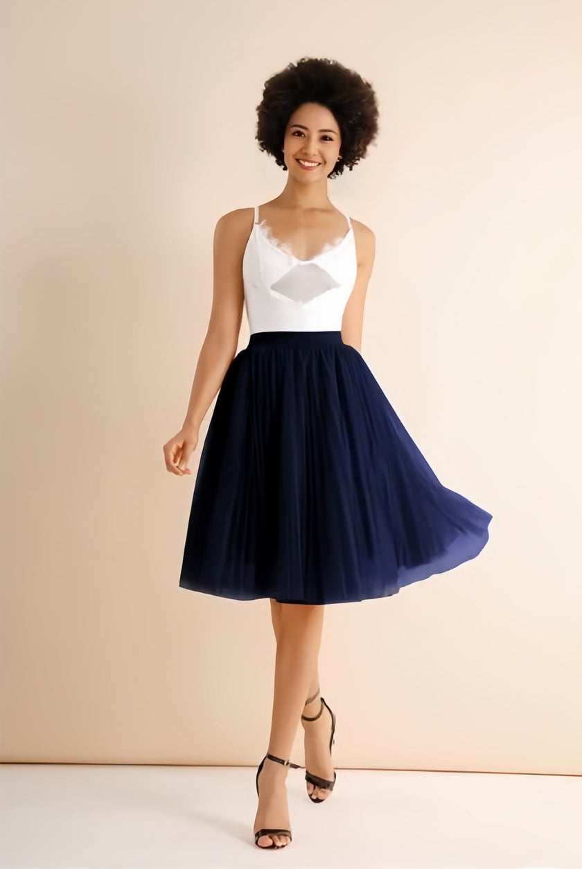 Navy pleated midi skirt with stretch waistband, flared A-line silhouette