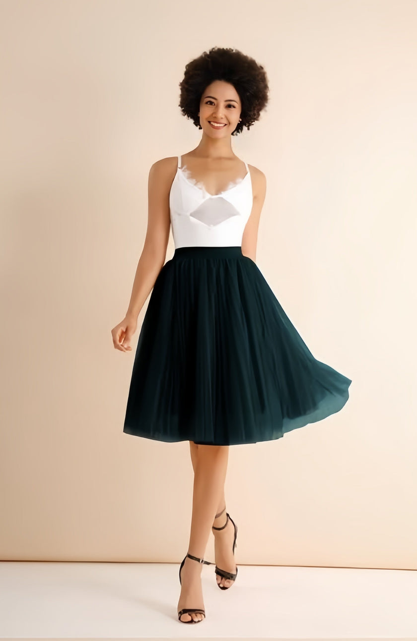 Dark green pleated midi skirt with stretch waistband, flared A-line silhouette
