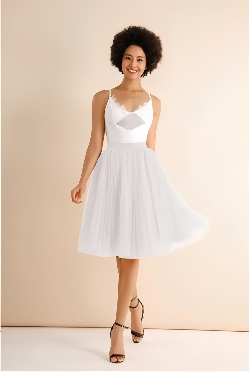 White pleated midi skirt with stretch waistband, flared A-line silhouette