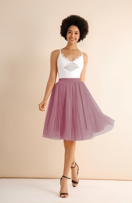 Light pink pleated midi skirt with elastic waist