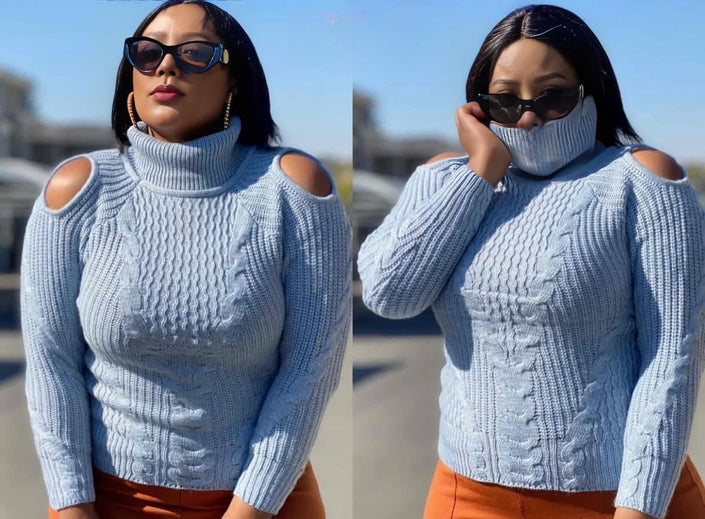 Light blue knit cold-shoulder turtleneck sweater with cable texture