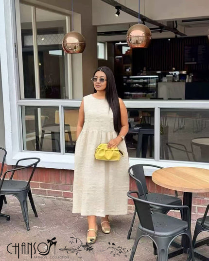 Beige sleeveless midi dress, round neck, high waist, loose A-line, textured embossed