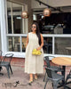 Beige sleeveless midi dress, round neck, high waist, loose A-line, textured embossed