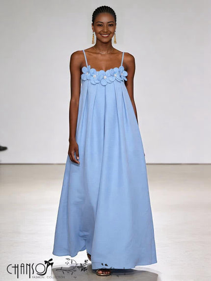light blue spaghetti strap maxi dress with layered floral applique at the bodice