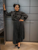 Black ruffle puff-sleeve blouse with gathered collar and voluminous shoulders