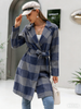 Blue and white check belted coat with long sleeves, lapels, and tie waist