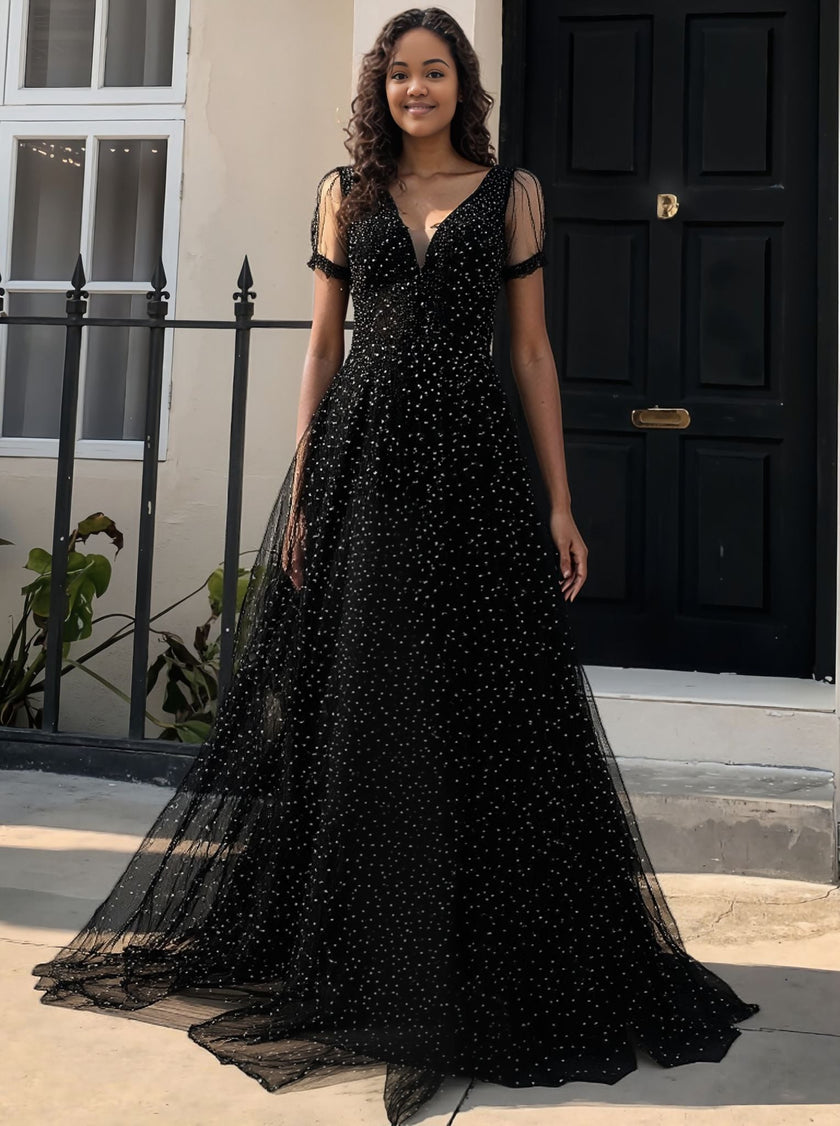 Black star-pattern maxi dress with sheer puff sleeves and V-neck bodice