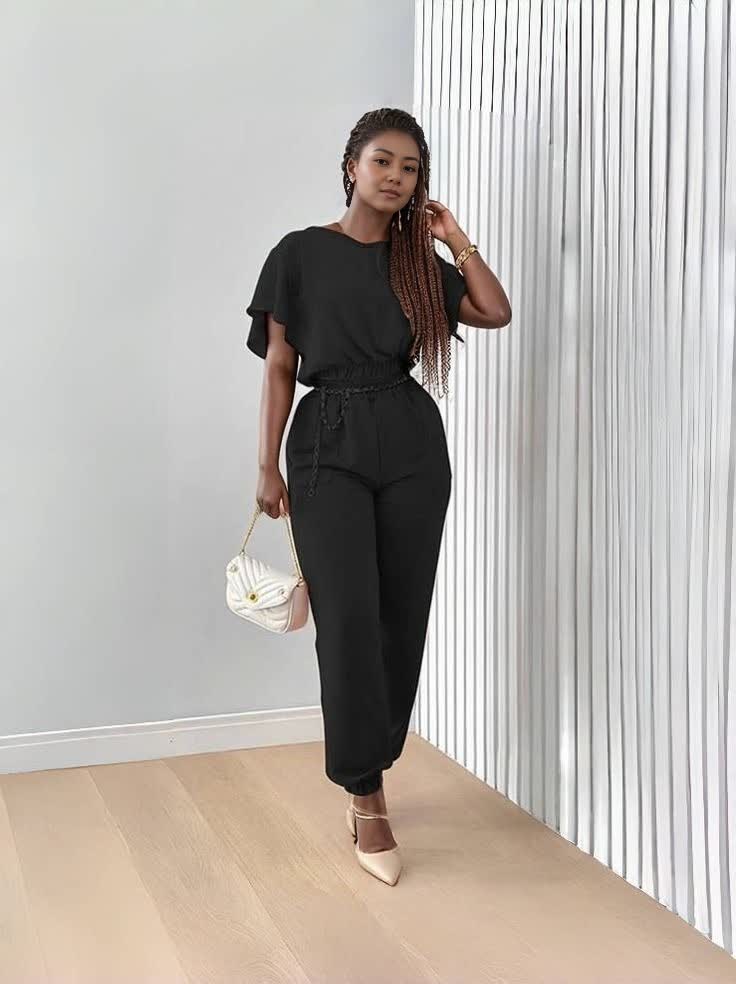 Black short-sleeve top and matching stretch-waist jogger pants set, tied belt
