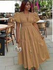 Tan tiered maxi dress with puff sleeves and V-neck, gathered bodice