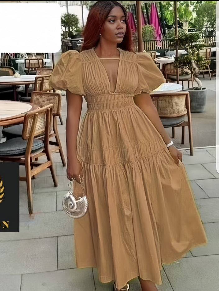 Tan tiered maxi dress with puff sleeves and V-neck, gathered bodice