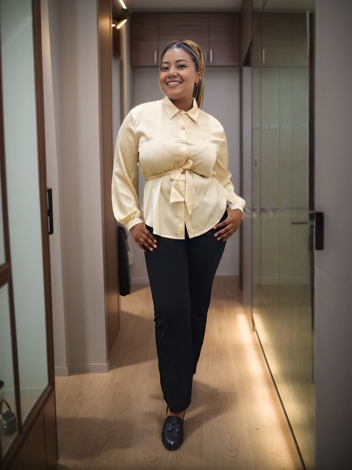 Off-white long-sleeve blouse with bow tie neckline and button front