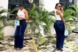 High-waist slim-fit jeans in dark blue, full-length front view