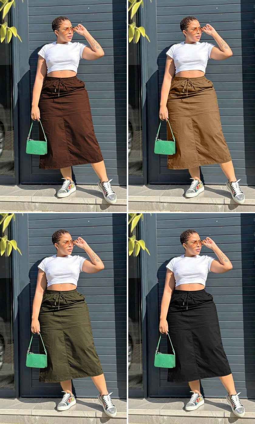High-waist midi skirt with stretch waistband and drawstring ties, medium-length A-line