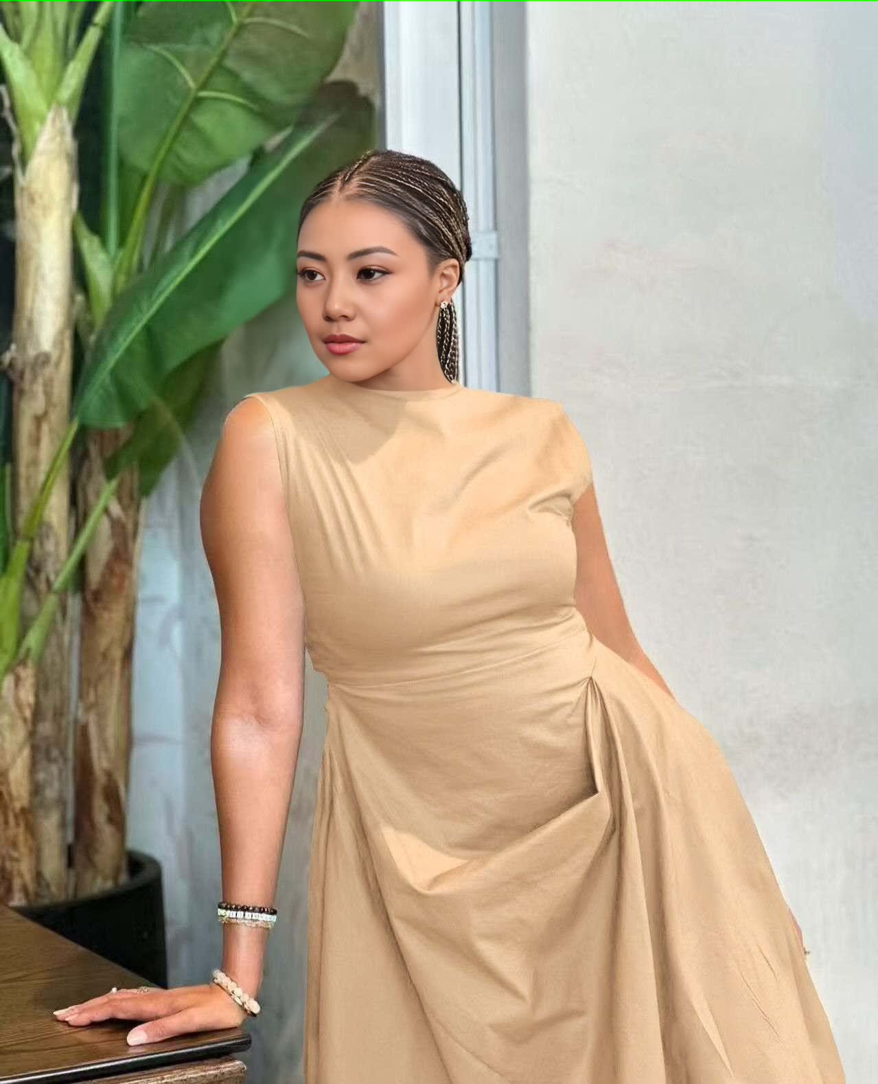 Sleeveless asym hem midi dress, tan with draped waist and flowing uneven skirt