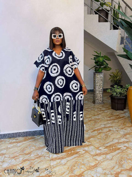 Relaxed navy maxi kaftan dress with short sleeves and bold white circular stripe motifs