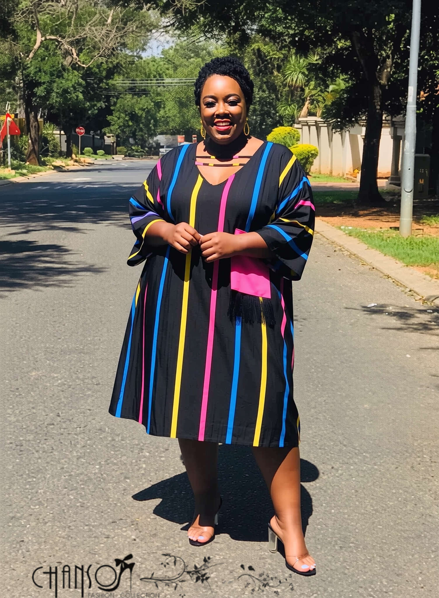 Midi dress with bold vertical multicolor stripes, V-neck and three-quarter sleeves