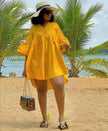 Plus size mini dress: yellow relaxed fit, V-neck with gathered yoke