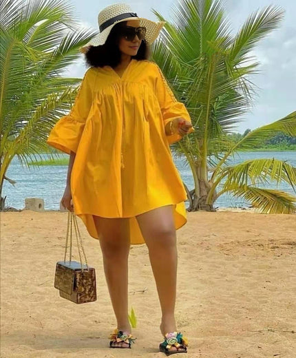 Plus size mini dress: yellow relaxed fit, V-neck with gathered yoke