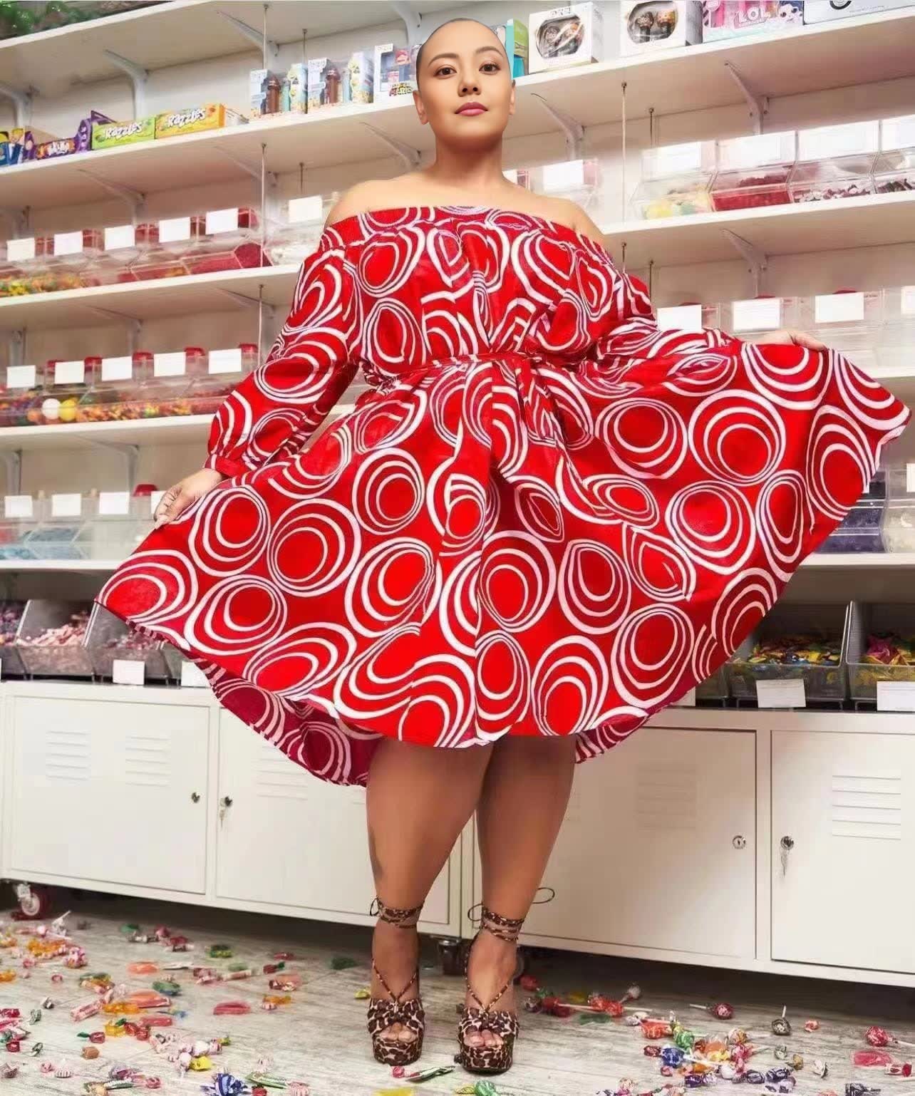 Red off-shoulder puff sleeve midi dress with white circular print