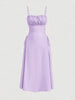 Suspenders dress with drawstrings on both sides