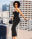 Black spaghetti-strap maxi bodycon dress, sleeveless ribbed knit with narrow straps
