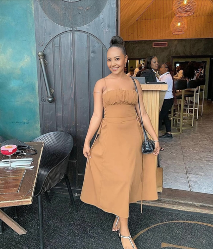 Tan midi dress with spaghetti straps and ruched bust, adjustable waist ties