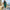 Dotted Long-Sleeve Knee-Length Dress with Fitted Silhouette and Button Accents